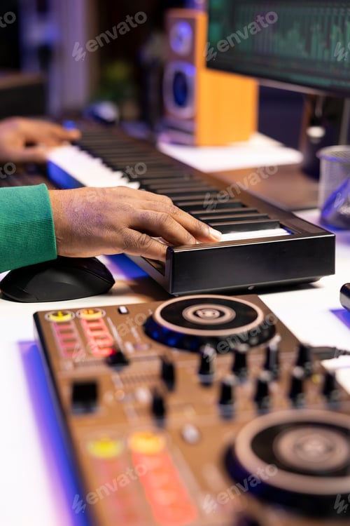 Preview: DJ Mixer and Electronic Keyboard on Desk