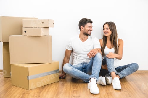 Preview: The young couple moving to the new house and sit on the floor