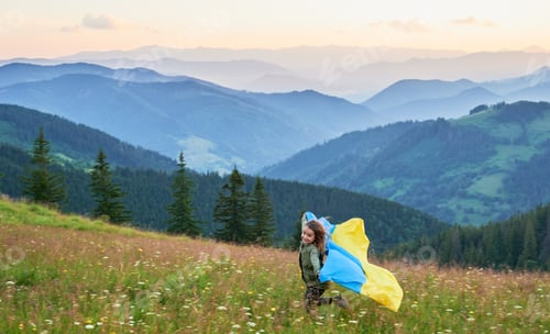 Preview: Happy Ukrainian running in Carpathian mountains.