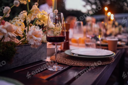 Preview: Elegant outdoor dining setup featuring a beautifully arranged table