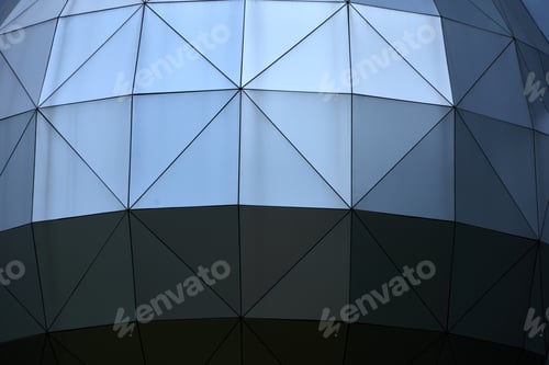 Preview: Futuristic Architecture with Geometric Panels and Triangular Patterns