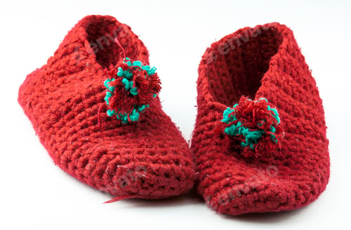 Preview: Cozy Red Knitted Slippers with Pompoms on White