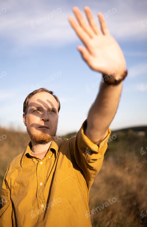 Preview: Autumn photo shoot of a guy in the field. Red-haired guy. Millennium. Youth and joy.