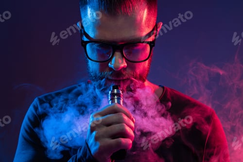 Preview: Vaping flavored e-liquid from an electronic cigarette
