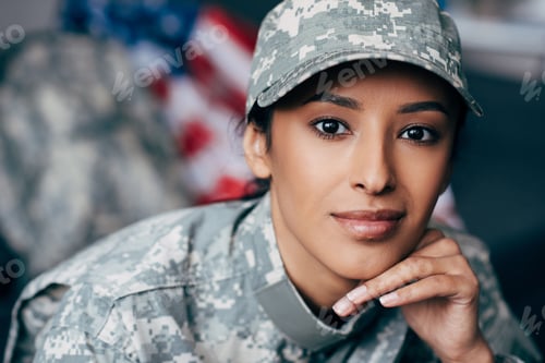 Preview: african american female soldier in military uniform looking at camera