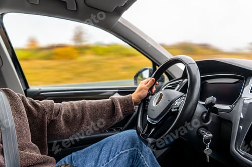 Preview: Behind the wheel on the highway. Feeling of road and freedom.