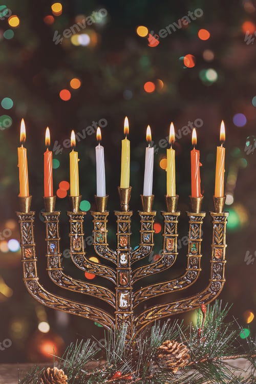 Preview: Colorful candles from a burning hanukkah candles in a menorah