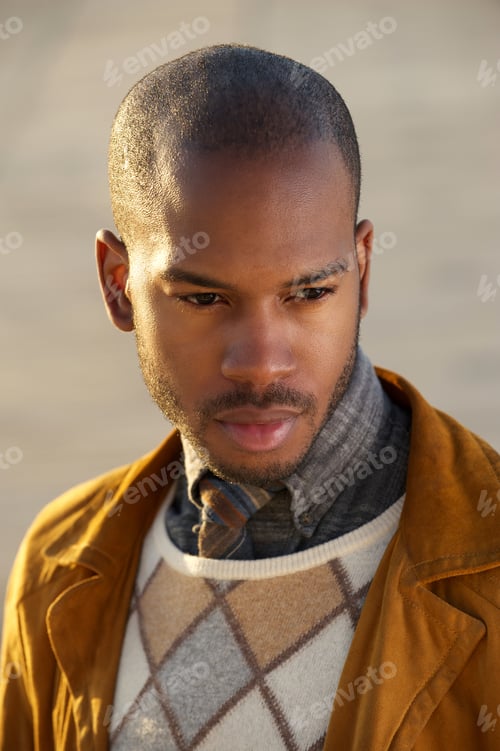 Preview: Portrait of a trendy male fashion model outdoors