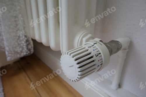 Preview: Home heating system thermostat close-up