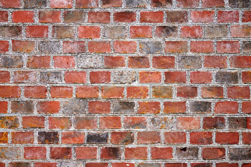 Preview: Red brick wall of old house, red brick texture, reliable brickwork masonry with bricklayer