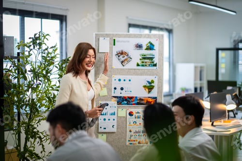 Preview: Group of young male and female business people in the office