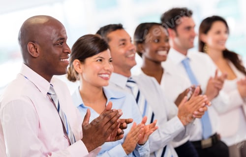 Preview: Successful Business Presentation And A Group Of People Applauding