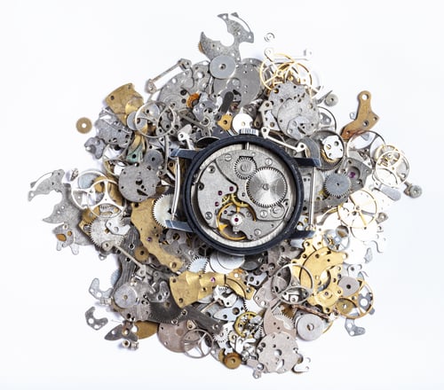Preview: top view of mechanic watch on pile of spare parts