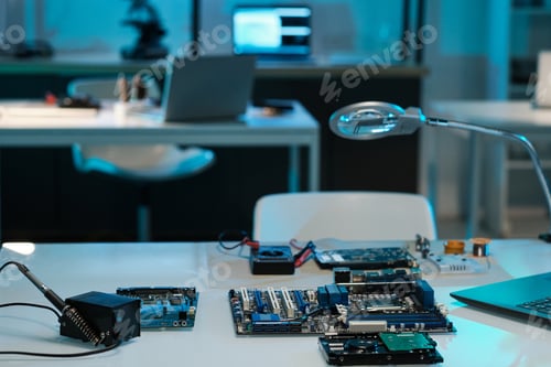 Preview: Workplace of engineer or technician with motherboard or circuit board