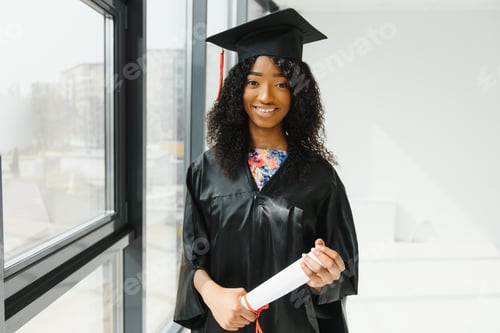 Preview: cheerful african american graduate student with diploma in her hand