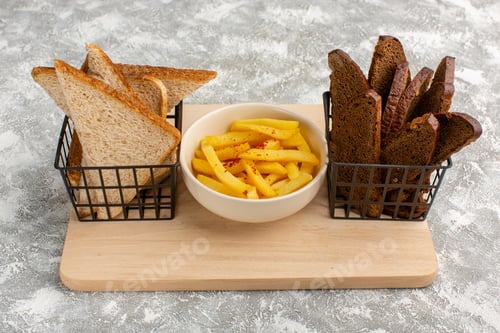 Preview: front view french fries inside white plate along with black and white bread on the light desk food