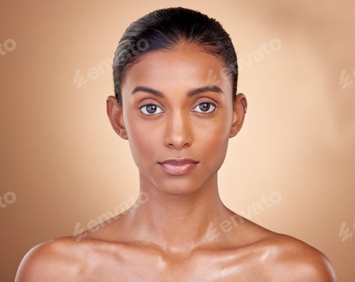Preview: Portrait, skincare and woman with natural beauty, cosmetics and dermatology on a brown studio backg