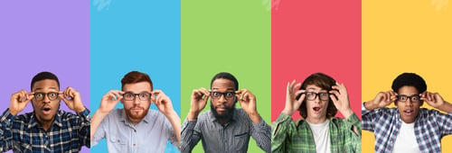 Preview: Surprised young men expressing great amazement wearing specs