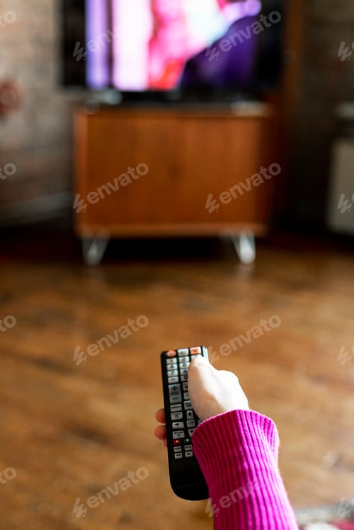 Preview: Woman swapping between TV channels