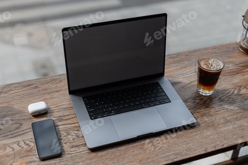 Preview: Laptop with smartphone, headphones and espresso tonic coffee