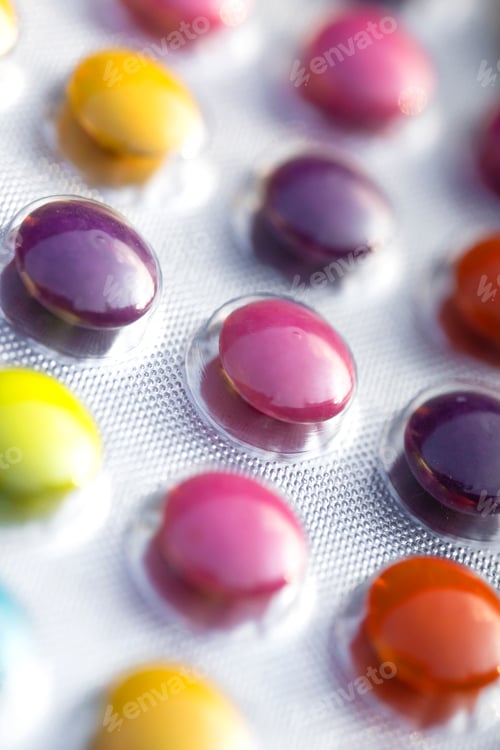 Preview: close-up, macro view of blister packs with colorful pills
