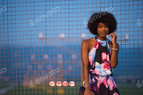 Preview: portrait of a young African-American woman in a summer dress