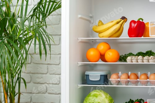 Preview: Well-Stocked Refrigerator With Fresh Produce, Eggs, and Other Groceries