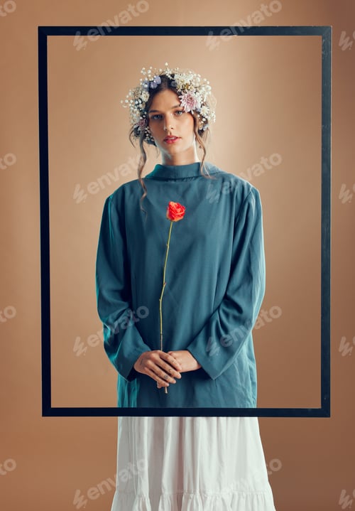 Preview: Woman, floral crown and studio with frame, rose or beauty for fashion in portrait by background. Mo