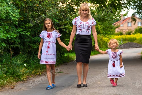 Preview: Family Ukrainians in vyshyvanka mother and children. Selective focus.