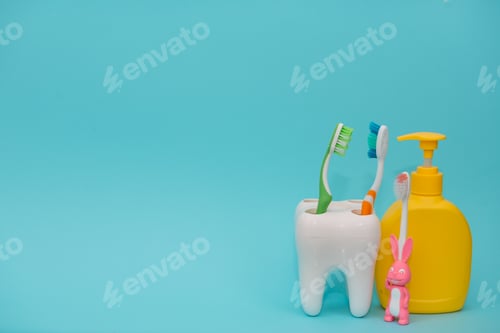 Preview: Shower accessories on a colored background. bathroom setting on blue background.