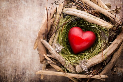 Preview: Easter heart decor on a wooden background. Pattern.