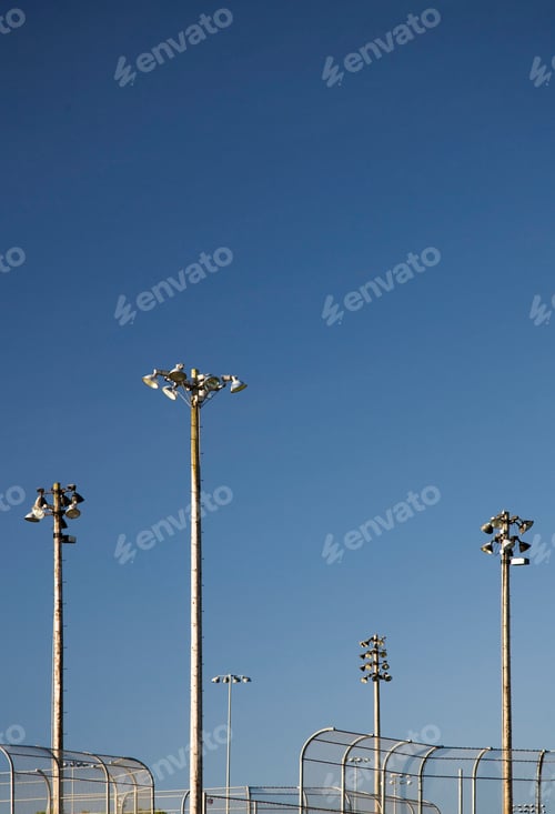 Preview: Floodlights Above Baseball Backstops