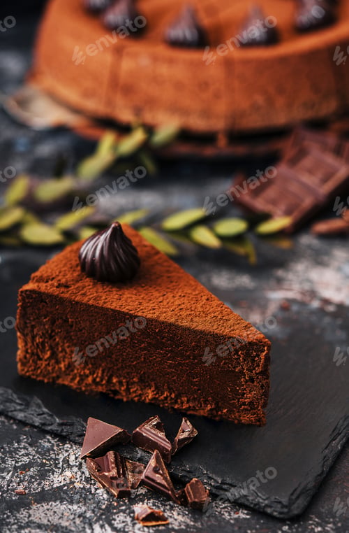 Preview: slice of tasty chocolate cake with chocolate sliced