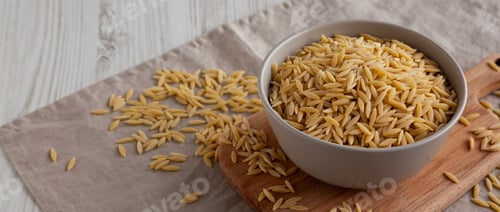 Preview: Organic Dried Orzo Pasta in a Bowl, side view.