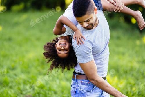Preview: Happy daughter playing with dad