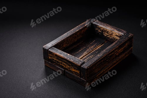 Preview: Empty rectangular wooden cutlery box on textured concrete background