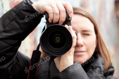 Preview: girl taking pictures in spring
