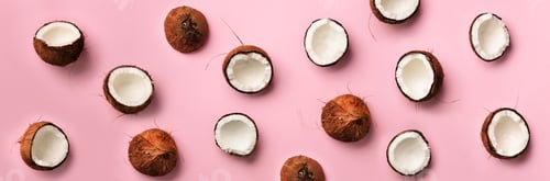 Preview: Pattern with ripe coconuts on pink background. Top View. Copy Space. Pop art design, creative summer