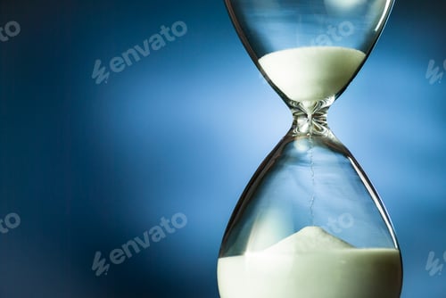 Preview: Sand running through an hourglass or egg timer