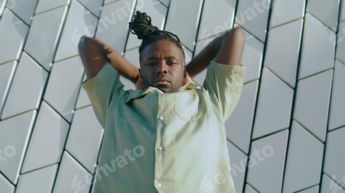 Preview: Involved dancer looking camera street portrait. Freestyle man dance closeup