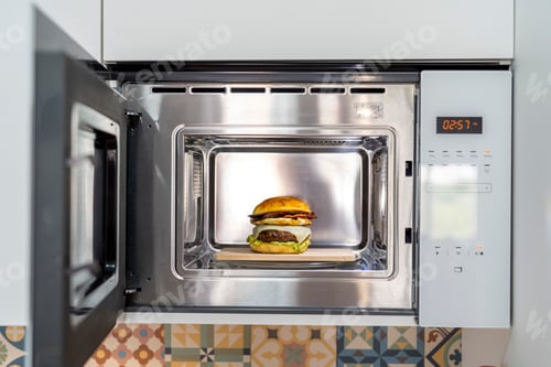 Preview: Close up of a hamburger inside a microwave