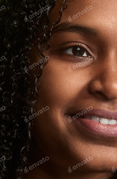 Preview: Half face of black woman with perfect smooth skin