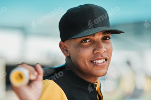 Preview: Shot of a young baseball player holding a baseball bat while posing outside on the pitch