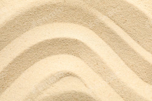 Preview: Seamless sand on a whole background, space for text and closeup. Summer vacation backdrop