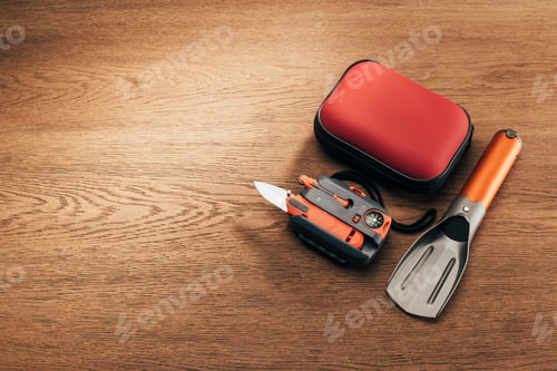 Preview: top view of tools for trekking and hiking on wooden table