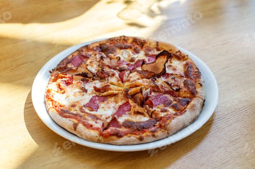 Preview: Fresh Baked Meat Lover's Pizza on Wooden Table