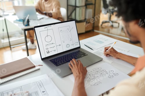 Preview: Designer Working on Mobile App Wireframe