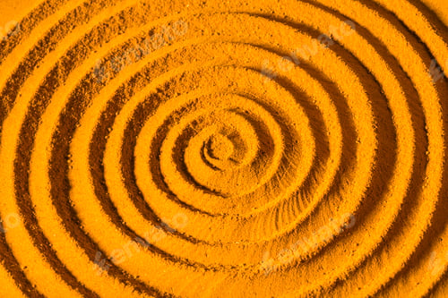 Preview: Turmeric powder spirally twisted, close-up image