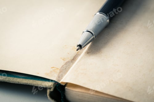 Preview: Vintage books and pen