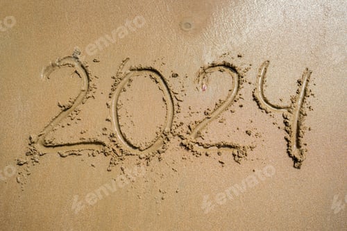 Preview: The Year 2024 Getting Written in Beautiful Sand at the Sunny Beachside Shoreline